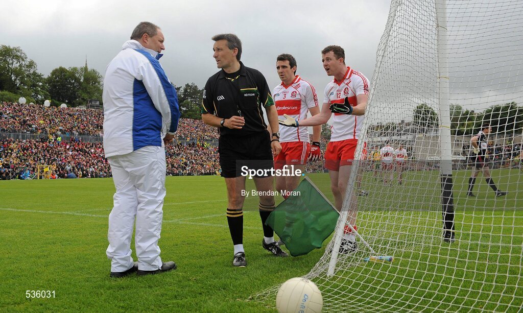 17 July 2011; Derry captain Barry McGoldrick, right, and full-back Kevin McGuckin appeal to referee Maurice Deegan after he awarded Donegal a penalty. Ulster GAA Football Senior Championship Final, Derry v Donegal, St Tiernach's Park, Clones, Co. Monaghan. Picture credit: Brendan Moran / SPORTSFILE