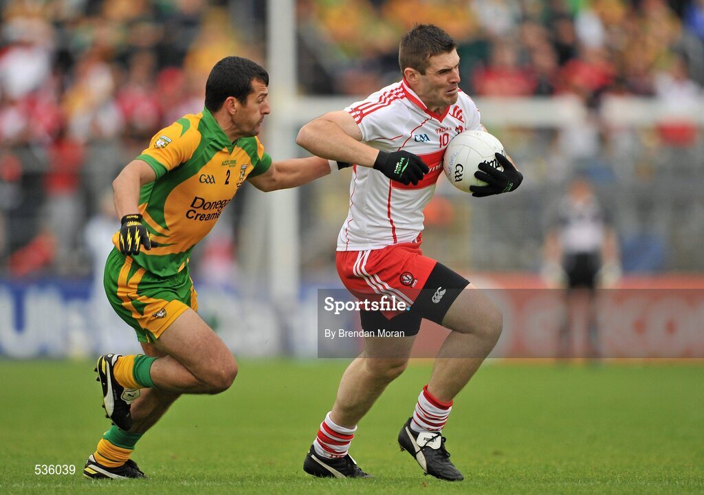 17 July 2011; Mark Lynch, Derry, in action against Frank McGlynn, Donegal. Ulster GAA Football Senior Championship Final, Derry v Donegal, St Tiernach's Park, Clones, Co. Monaghan. Picture credit: Brendan Moran / SPORTSFILE