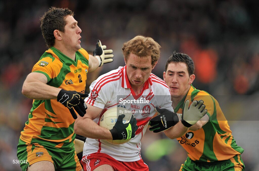 17 July 2011; Sean Leo McGoldrick, Derry, in action against Ryan Bradley, left, and Mark McHugh, Donegal. Ulster GAA Football Senior Championship Final, Derry v Donegal, St Tiernach's Park, Clones, Co. Monaghan. Picture credit: Brendan Moran / SPORTSFILE