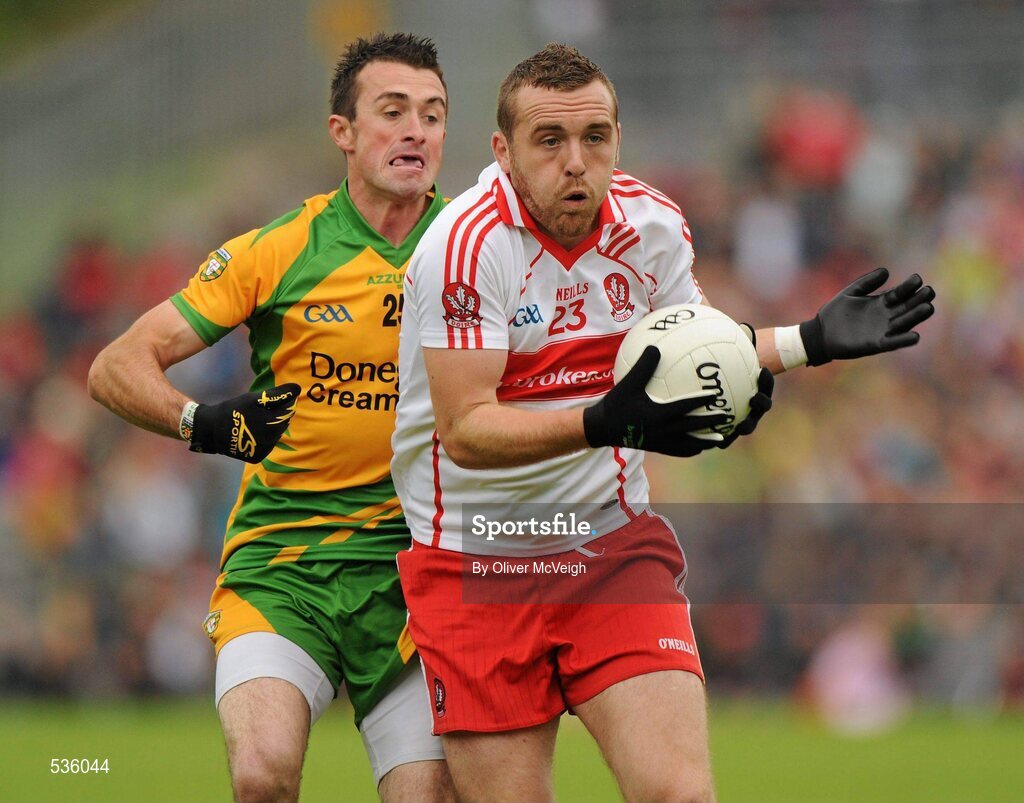 17 July 2011; Emmett McGuckin, Derry, in action against David Walsh, Donegal. Ulster GAA Football Senior Championship Final, Derry v Donegal, St Tiernach's Park, Clones, Co. Monaghan. Picture credit: Oliver McVeigh / SPORTSFILE