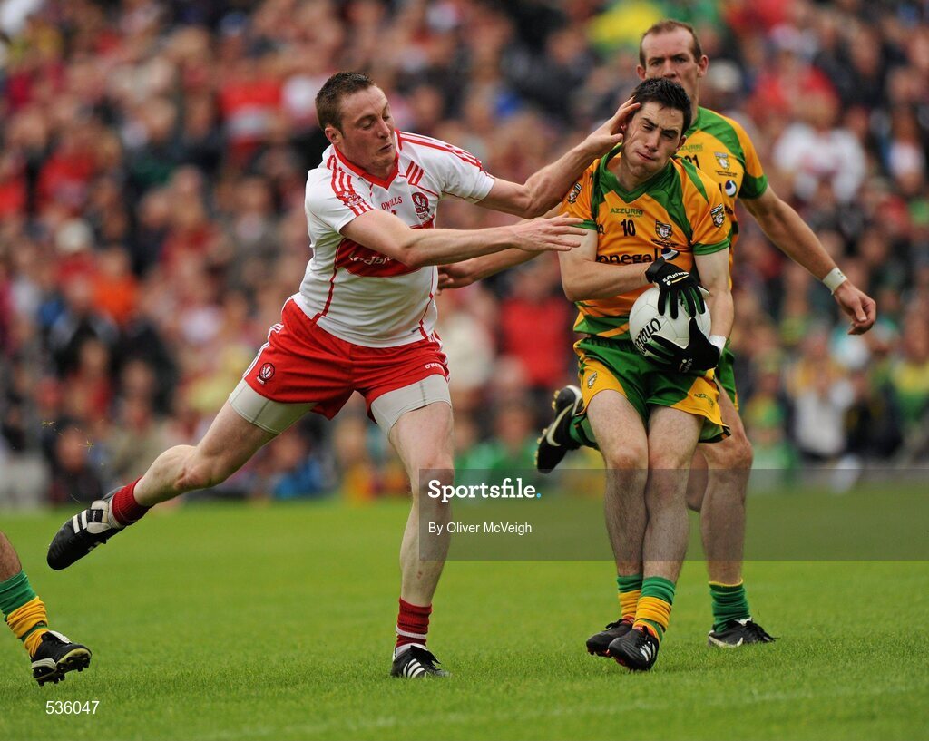 17 July 2011; Mark McHugh, Donegal, in action against Joe Diver, Derry. Ulster GAA Football Senior Championship Final, Derry v Donegal, St Tiernach's Park, Clones, Co. Monaghan. Picture credit: Oliver McVeigh / SPORTSFILE