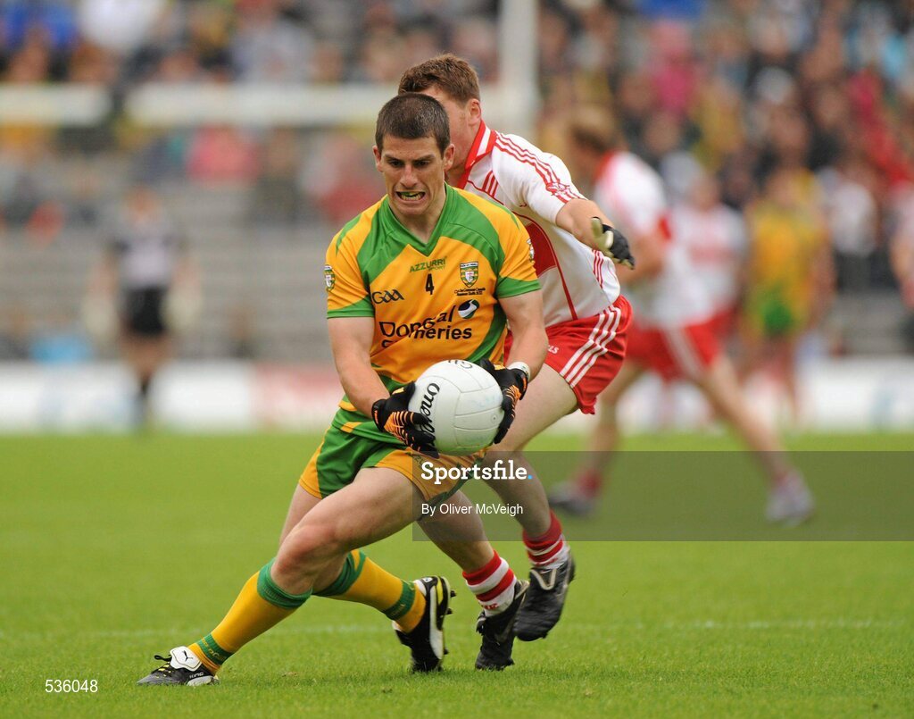 17 July 2011; Paddy McGrath, Donegal, in action against Conleith Gilligan, Derry. Ulster GAA Football Senior Championship Final, Derry v Donegal, St Tiernach's Park, Clones, Co. Monaghan. Picture credit: Oliver McVeigh / SPORTSFILE