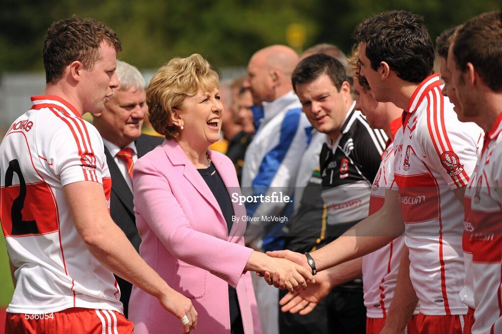 17 July 2011; The President of Ireland Mary McAleese shakes hands with Kevin McGuckin, Derry. Ulster GAA Football Senior Championship Final, Derry v Donegal, St Tiernach's Park, Clones, Co. Monaghan. Picture credit: Oliver McVeigh / SPORTSFILE