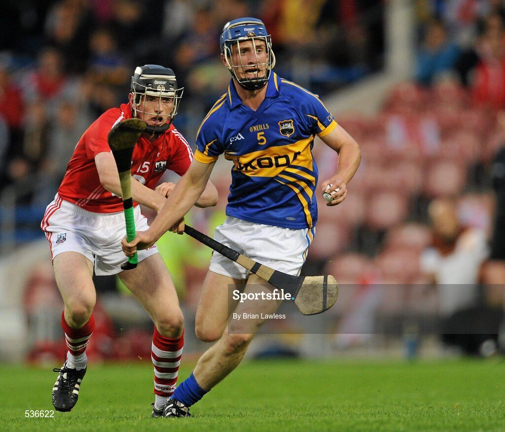 15 July 2011; Brian Stapleton, Tipperary, in action against Jamie Coughlan, Cork. Bord Gáis Energy Munster GAA Hurling Under 21 Championship Semi-Final, Tipperary v Cork, Semple Stadium, Thurles, Co. Tipperary. Picture credit: Brian Lawless / SPORTSFILE