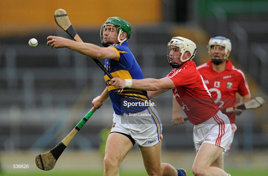 15 July 2011; Noel McGrath, Tipperary, in action against John O'Neill, Cork. Bord Gáis Energy Munster GAA Hurling Under 21 Championship Semi-Final, Tipperary v Cork, Semple Stadium, Thurles, Co. Tipperary. Picture credit: Brian Lawless / SPORTSFILE