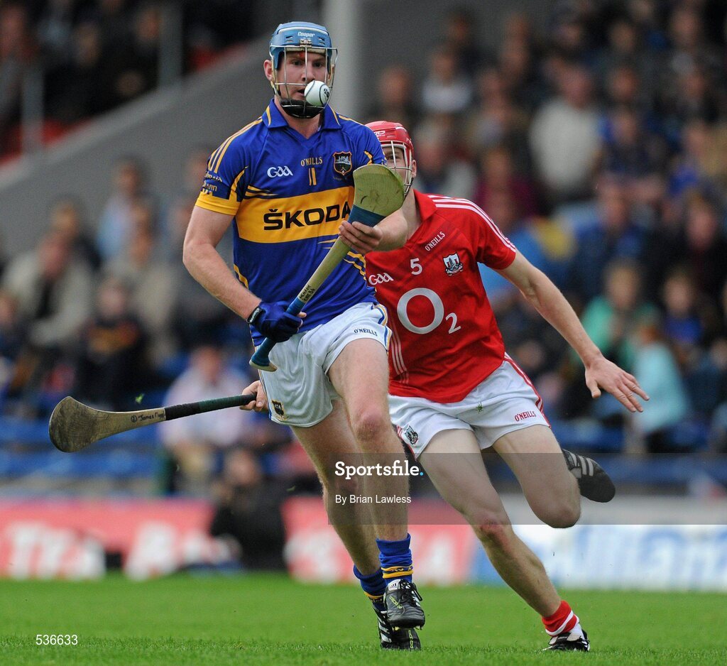 15 July 2011; Paddy Murphy, Tipperary, in action against James Nagle, Cork. Bord Gáis Energy Munster GAA Hurling Under 21 Championship Semi-Final, Tipperary v Cork, Semple Stadium, Thurles, Co. Tipperary. Picture credit: Brian Lawless / SPORTSFILE