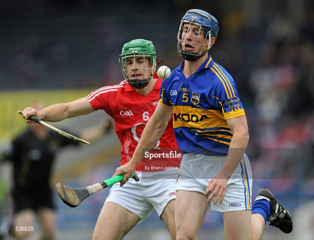 15 July 2011; Brian Stapleton, Tipperary, in action against William Egan, Cork. Bord Gáis Energy Munster GAA Hurling Under 21 Championship Semi-Final, Tipperary v Cork, Semple Stadium, Thurles, Co. Tipperary. Picture credit: Brian Lawless / SPORTSFILE