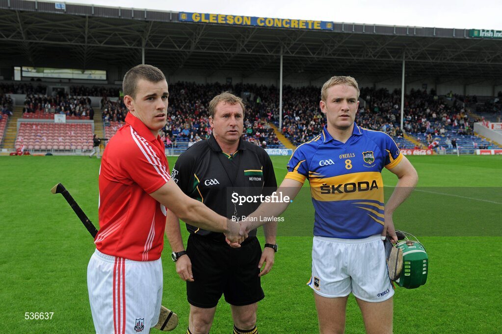 15 July 2011; Referee Michael Wadding with team captains William Egan, Cork, and Noel McGrath, Tipperary. Bord Gáis Energy Munster GAA Hurling Under 21 Championship Semi-Final, Tipperary v Cork, Semple Stadium, Thurles, Co. Tipperary. Picture credit: Brian Lawless / SPORTSFILE