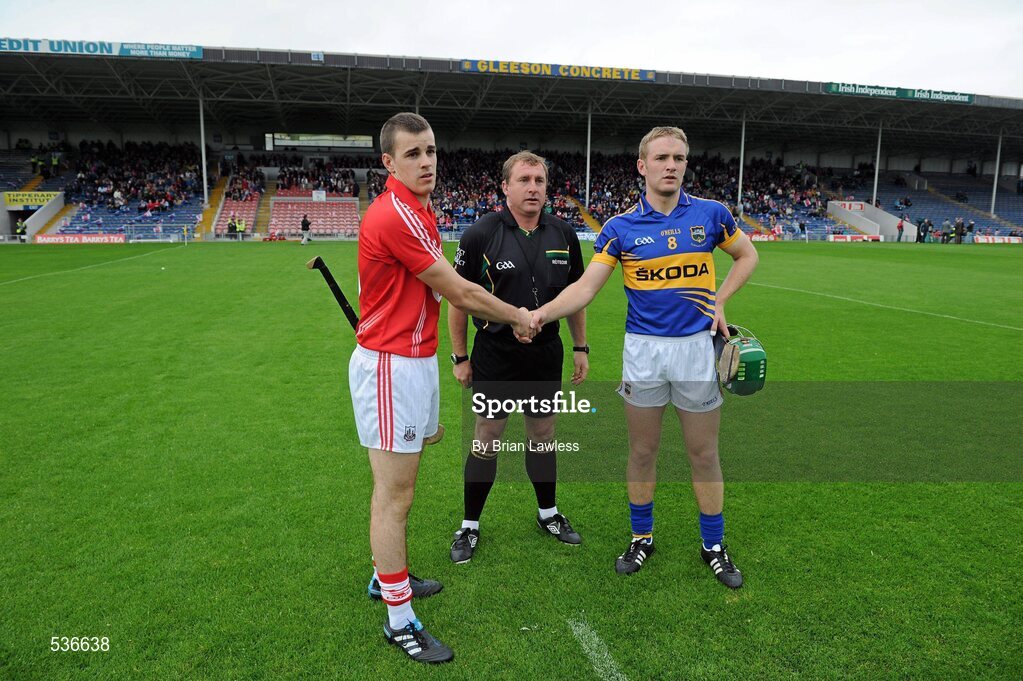 15 July 2011; Referee Michael Wadding with team captains William Egan, Cork, and Noel McGrath, Tipperary. Bord Gáis Energy Munster GAA Hurling Under 21 Championship Semi-Final, Tipperary v Cork, Semple Stadium, Thurles, Co. Tipperary. Picture credit: Brian Lawless / SPORTSFILE