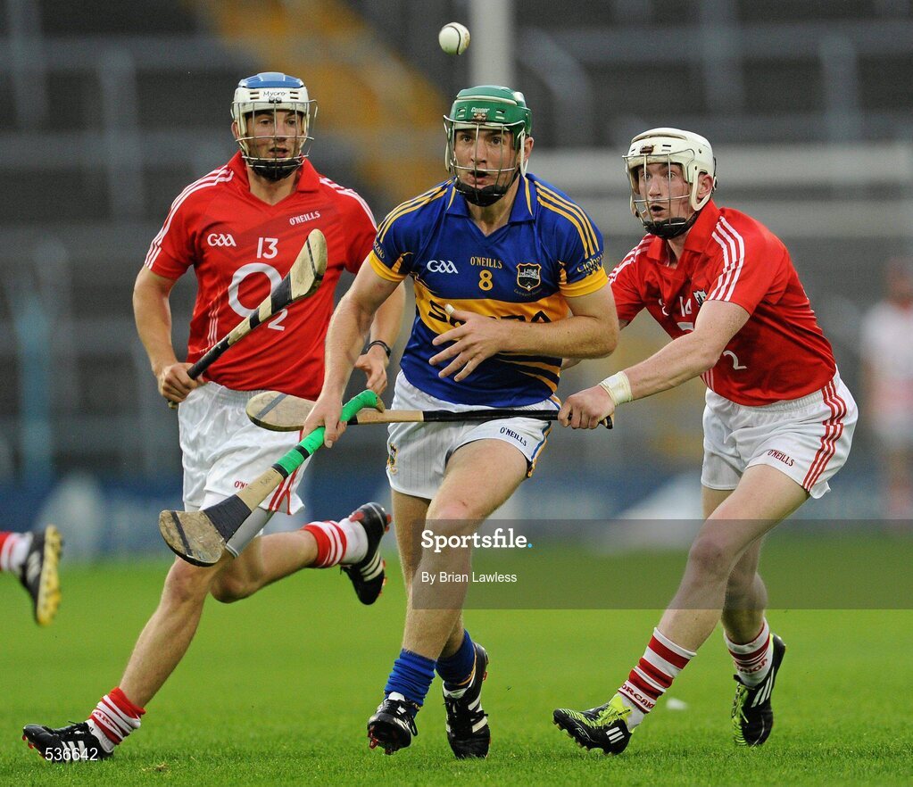 15 July 2011; Noel McGrath, Tipperary, in action against Luke O'Farrell, left, and Michael O'Sullivan, Cork. Bord Gáis Energy Munster GAA Hurling Under 21 Championship Semi-Final, Tipperary v Cork, Semple Stadium, Thurles, Co. Tipperary. Picture credit: Brian Lawless / SPORTSFILE