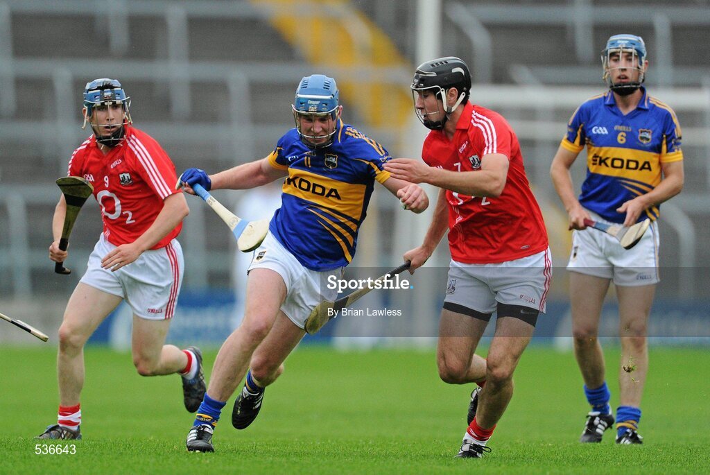 15 July 2011; Paddy Murphy, Tipperary, in action against Mark Ellis, Cork. Bord Gáis Energy Munster GAA Hurling Under 21 Championship Semi-Final, Tipperary v Cork, Semple Stadium, Thurles, Co. Tipperary. Picture credit: Brian Lawless / SPORTSFILE