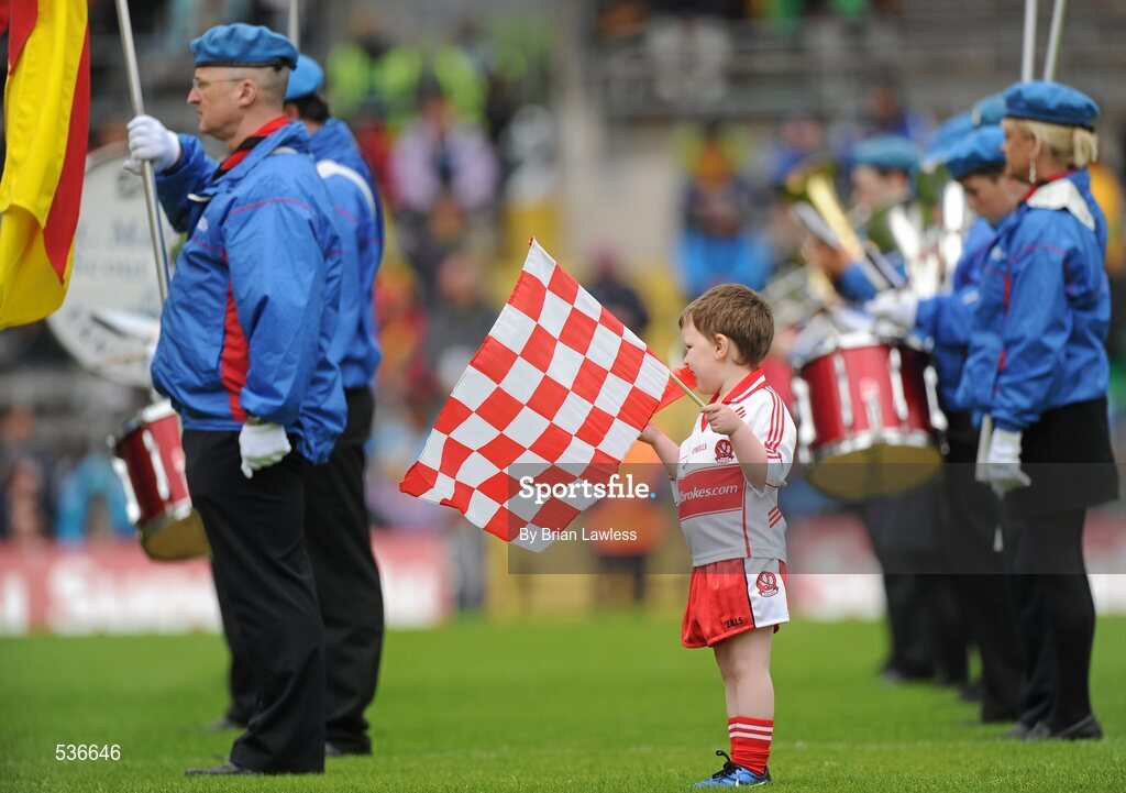 17 July 2011; A young flag bearer with the St. Michael's Band. Ulster GAA Football Senior Championship Final, Derry v Donegal, St Tiernach's Park, Clones, Co. Monaghan. Picture credit: Brian Lawless / SPORTSFILE