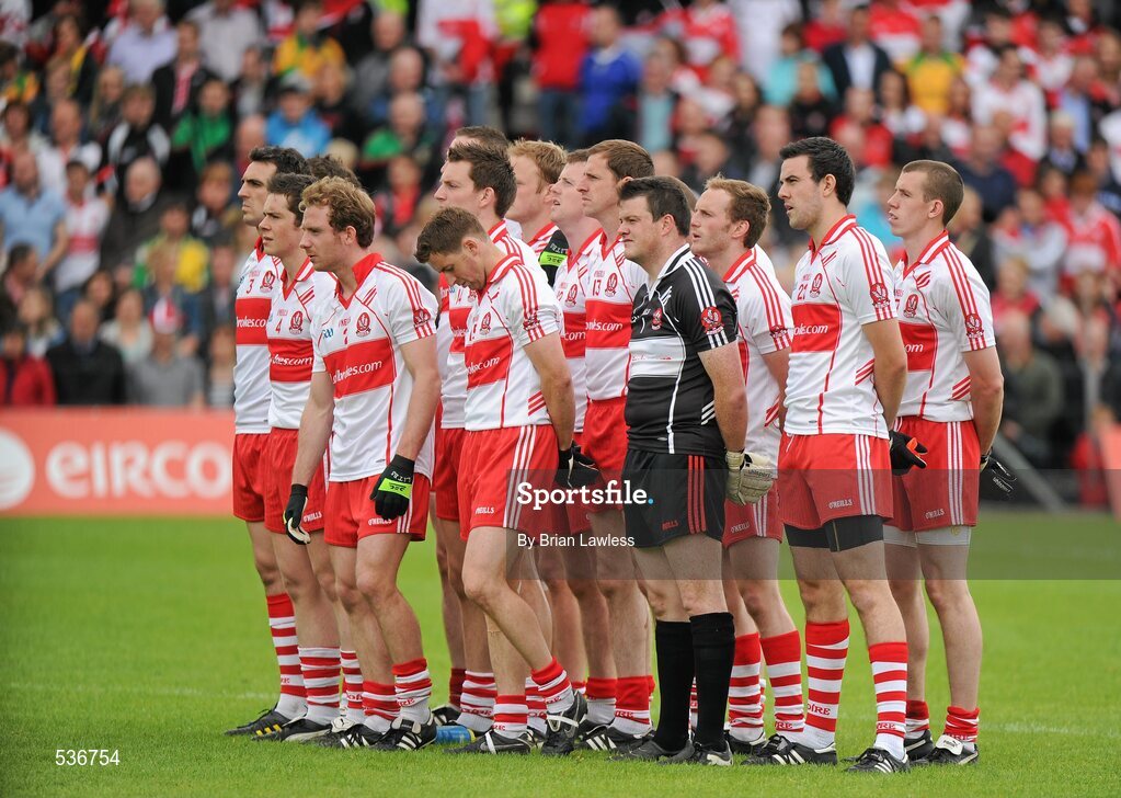 17 July 2011; The Derry players stand for the National Anthem. Ulster GAA Football Senior Championship Final, Derry v Donegal, St Tiernach's Park, Clones, Co. Monaghan. Picture credit: Brian Lawless / SPORTSFILE