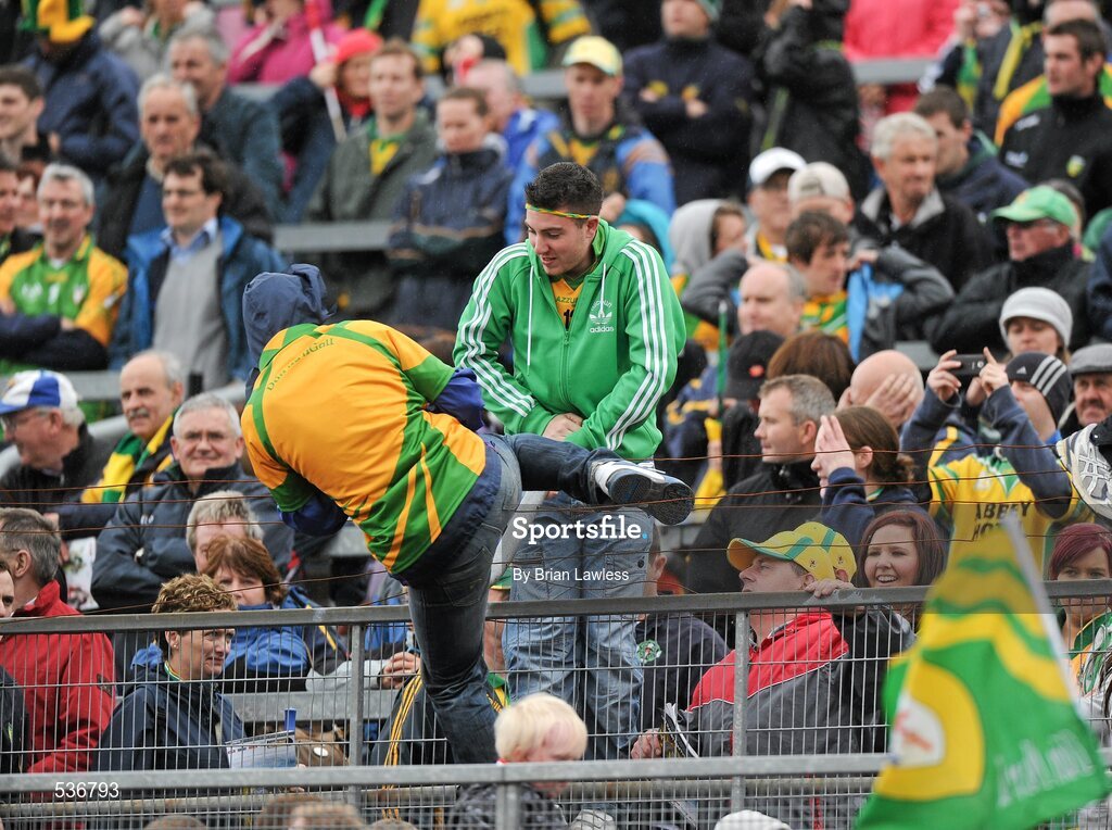 17 July 2011; Donegal supporters climb a fence to get to the pitch after the match. Ulster GAA Football Senior Championship Final, Derry v Donegal, St Tiernach's Park, Clones, Co. Monaghan. Picture credit: Brian Lawless / SPORTSFILE