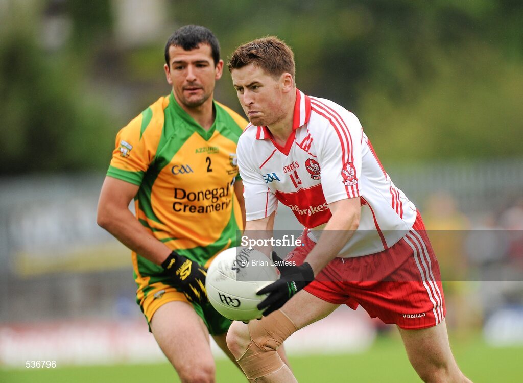 17 July 2011; Conleith Gilligan, Derry, in action against Frank McGlynn, Donegal. Ulster GAA Football Senior Championship Final, Derry v Donegal, St Tiernach's Park, Clones, Co. Monaghan. Picture credit: Brian Lawless / SPORTSFILE