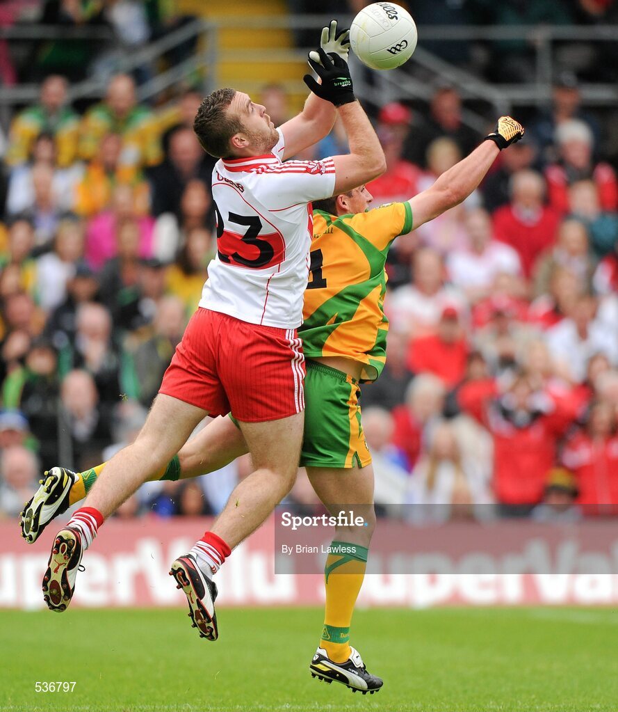 17 July 2011; Emmett McGuckin, Derry, in action against Paddy McGrath, Donegal. Ulster GAA Football Senior Championship Final, Derry v Donegal, St Tiernach's Park, Clones, Co. Monaghan. Picture credit: Brian Lawless / SPORTSFILE