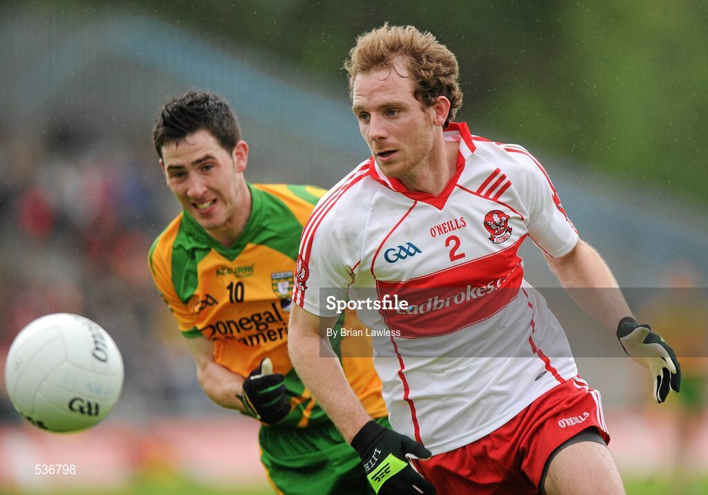 17 July 2011; Sen Leo McGoldrick, Derry, in action against Mark McHugh, Donegal. Ulster GAA Football Senior Championship Final, Derry v Donegal, St Tiernach's Park, Clones, Co. Monaghan. Picture credit: Brian Lawless / SPORTSFILE