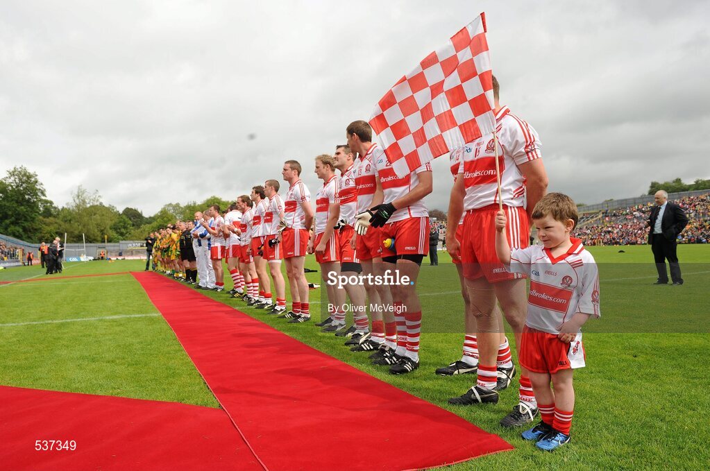 17 July 2011; Derry mascot four year old Donal O'Connor waiting alongside the teams to meet the President of Ireland Mary McAleese. Ulster GAA Football Senior Championship Final, Derry v Donegal, St Tiernach's Park, Clones, Co. Monaghan. Picture credit: Oliver McVeigh / SPORTSFILE