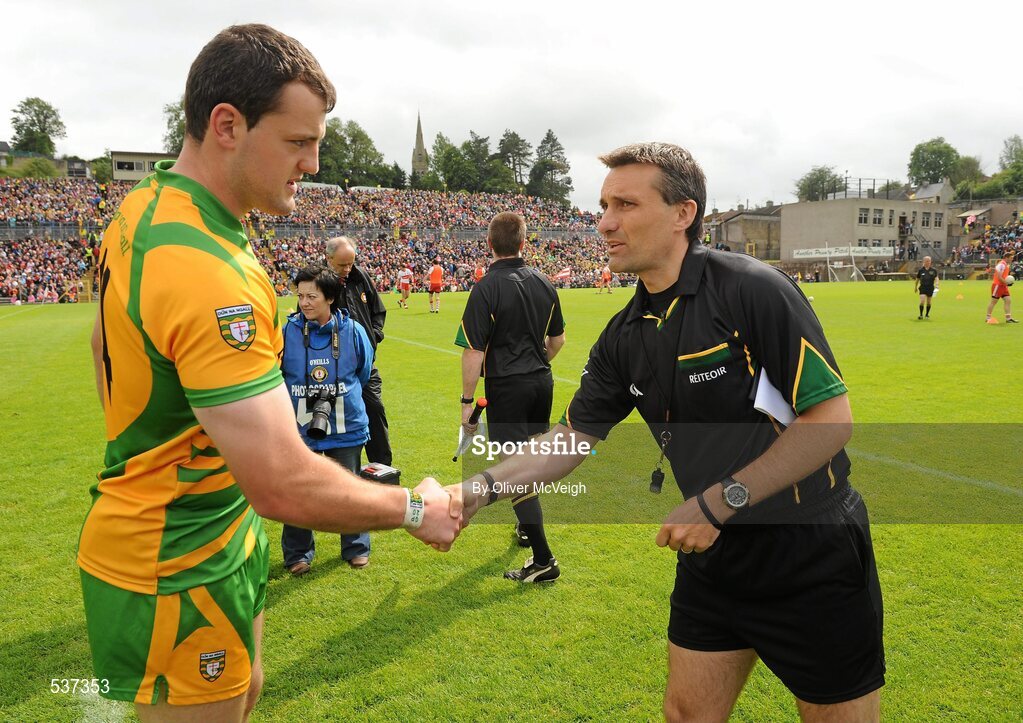 17 July 2011; Donegal Captain Michael Murphy shakes hands with Referee Maurice Deegan. Ulster GAA Football Senior Championship Final, Derry v Donegal, St Tiernach's Park, Clones, Co. Monaghan. Picture credit: Oliver McVeigh / SPORTSFILE