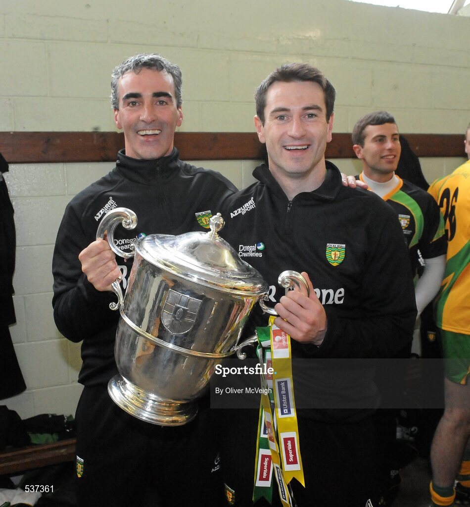 17 July 2011; Donegal manager Jim McGuinness, left, along with his assistant Rory Gallagher, celebrate with the Anglo Celt cup. Ulster GAA Football Senior Championship Final, Derry v Donegal, St Tiernach's Park, Clones, Co. Monaghan. Picture credit: Oliver McVeigh / SPORTSFILE