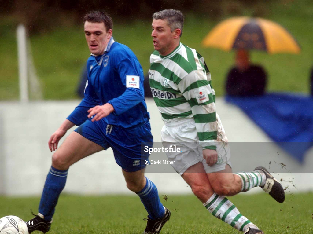 27 February 2002; Brendan Hughes of Limerick in action against Tony Cousins of Shamrock Rovers during the eircom League Cup Semi-Final match between Limerick and Shamrock Rovers at Jackman Park in Limerick. Photo by David Maher/Sportsfile