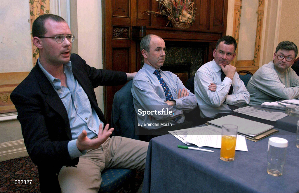 4 December 2001; Johnny Lyons of 98FM, left, watched by Referee Declan Hanney, National League Commissioner Roy Dooney and Declan Hughes, Treasurer, NLU, during the National League United Forum at Wynne's Hotel in Dublin. Photo by Brendan Moran/Sportsfile