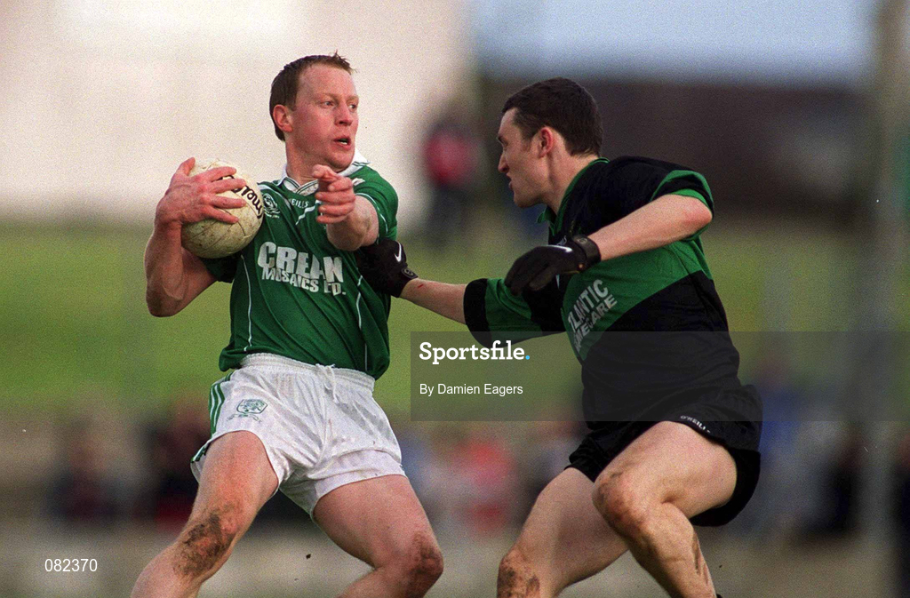 2 March 2002; David Tiernan of Charlestown Sarsfield is tackled by Sean O'Brien of Nemo Ranger during the AIB GAA Football All-Ireland Senior Club Championship Semi-Final match between Nemo Rangers and Charlestown Sarsfield at McDonagh Park in Nenagh, Tipperary. Photo by Damien Eagers/Sportsfile