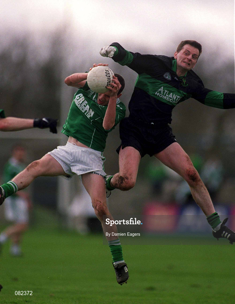 2 March 2002; Paul Mulligan of Charlestown Sarsfield iields a high ball ahead of Kevin Cahill of Nemo Rangers during the AIB GAA Football All-Ireland Senior Club Championship Semi-Final match between Nemo Rangers and Charlestown Sarsfield at McDonagh Park in Nenagh, Tipperary. Photo by Damien Eagers/Sportsfile
