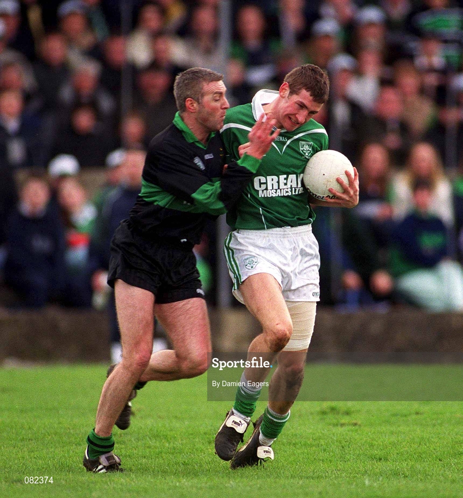 2 March 2002; Richard Haran of Charlestown Sarsfield is tackled by Larry Kavanagh of Nemo Rangers during the AIB GAA Football All-Ireland Senior Club Championship Semi-Final match between Nemo Rangers and Charlestown Sarsfield at McDonagh Park in Nenagh, Tipperary. Photo by Damien Eagers/Sportsfile