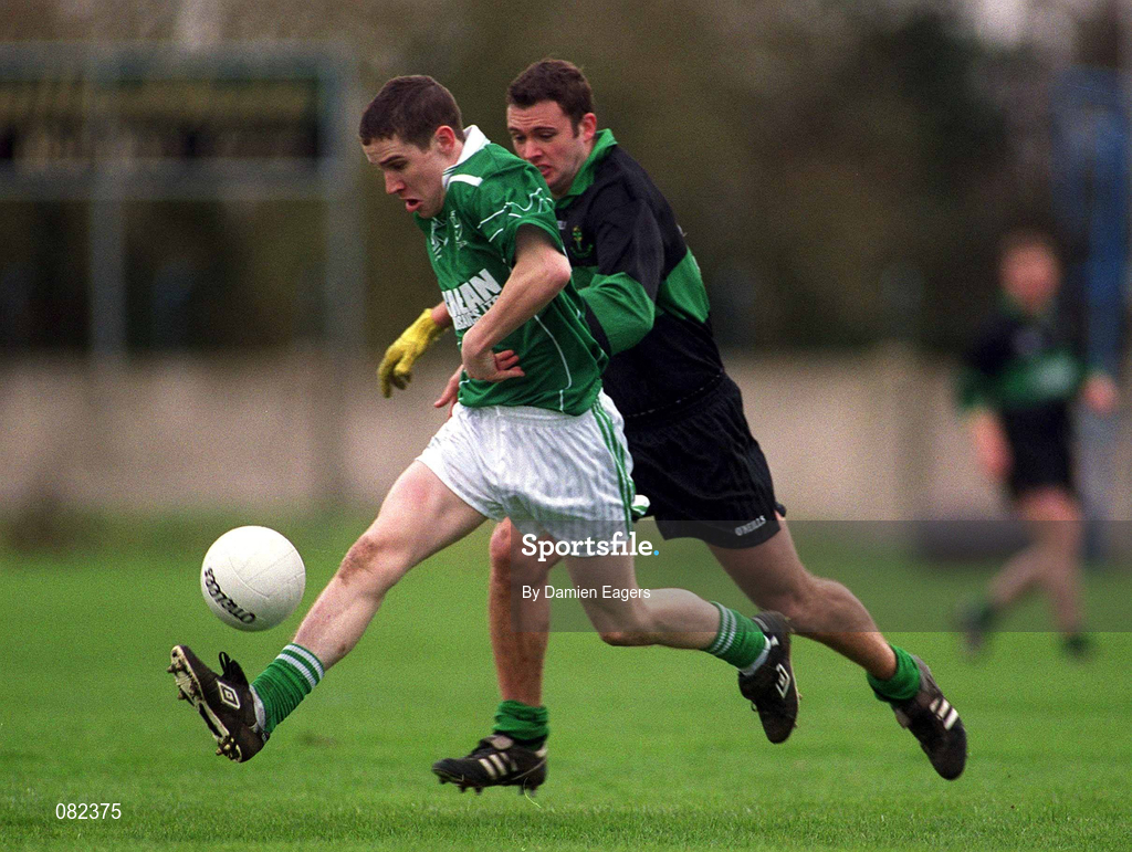 2 March 2002; Paul Mulligan of Charlestown Sarsfield races clear of Garry Murphy of Nemo Rangers during the AIB GAA Football All-Ireland Senior Club Championship Semi-Final match between Nemo Rangers and Charlestown Sarsfield at McDonagh Park in Nenagh, Tipperary. Photo by Damien Eagers/Sportsfile