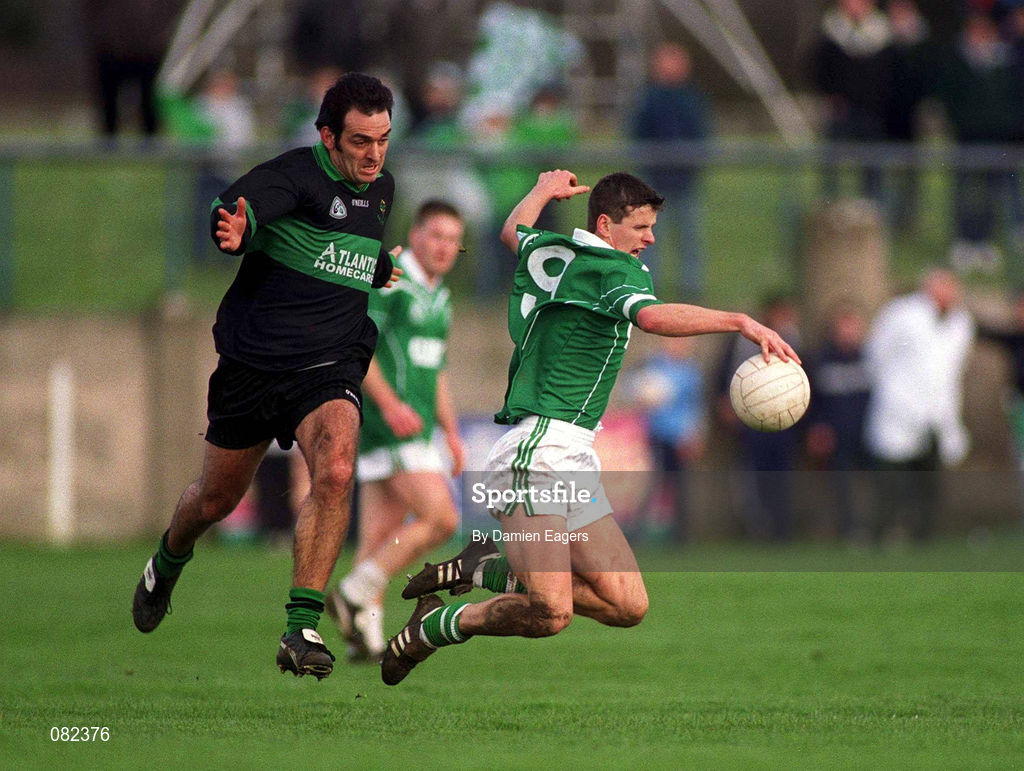 2 March 2002; Aidan Higgins of Charlestown Sarsfield is tackled by John Coogan of Nemo Rangers during the AIB GAA Football All-Ireland Senior Club Championship Semi-Final match between Nemo Rangers and Charlestown Sarsfield at McDonagh Park in Nenagh, Tipperary. Photo by Damien Eagers/Sportsfile