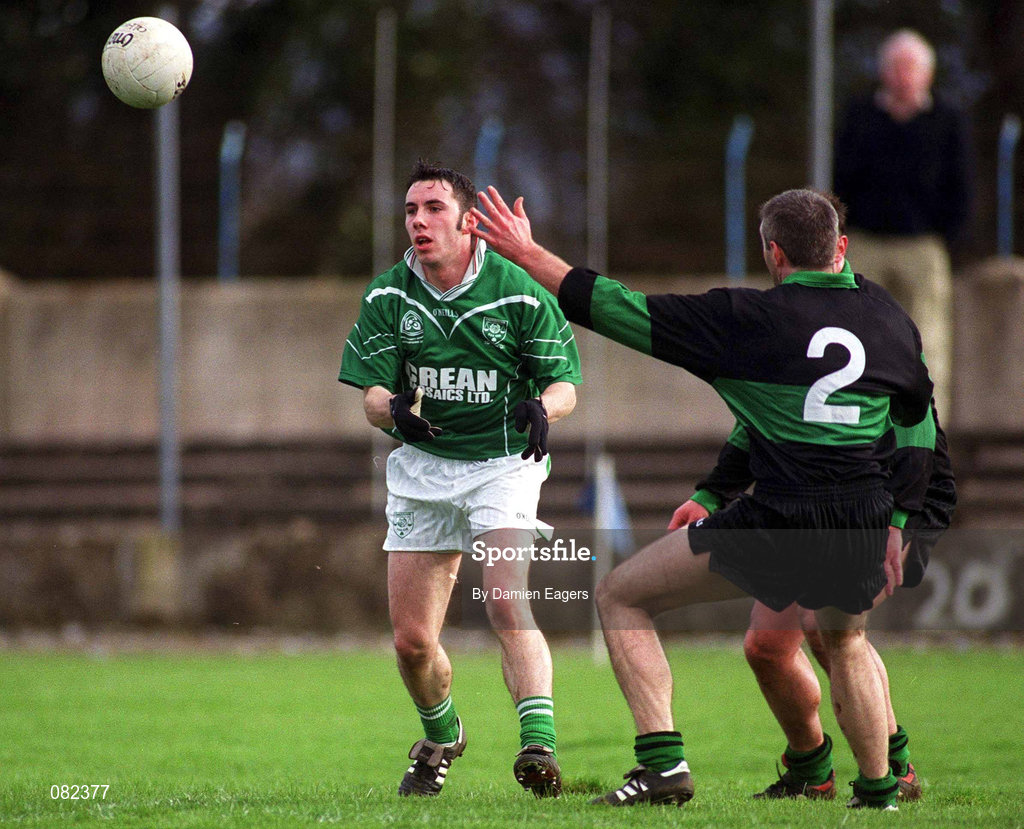 2 March 2002; Padraic Horkan of Charlestown Sarsfield is tackled by Larry Kavanagh of Nemo Rangers during the AIB GAA Football All-Ireland Senior Club Championship Semi-Final match between Nemo Rangers and Charlestown Sarsfield at McDonagh Park in Nenagh, Tipperary. Photo by Damien Eagers/Sportsfile