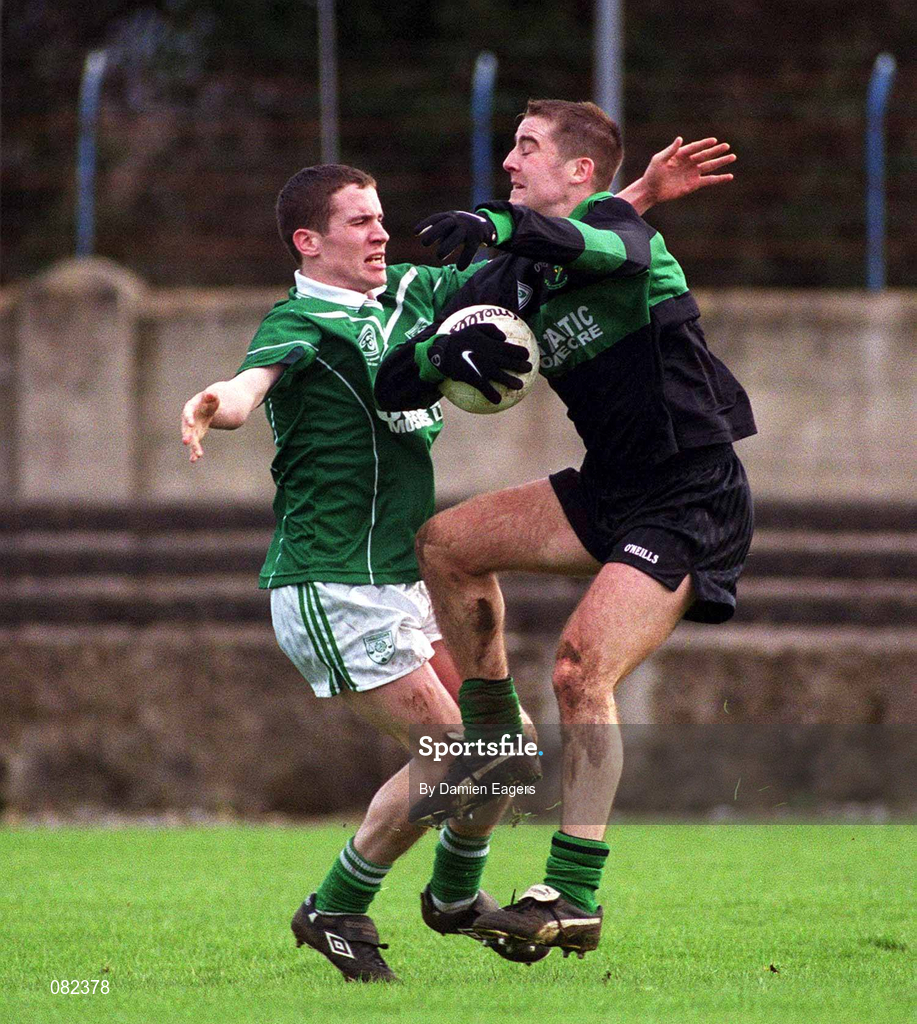 2 March 2002; Niall Geary of Nemo Rangers is tackled by Paul Mulligan of Charlestown Sarsfield during the AIB GAA Football All-Ireland Senior Club Championship Semi-Final match between Nemo Rangers and Charlestown Sarsfield at McDonagh Park in Nenagh, Tipperary. Photo by Damien Eagers/Sportsfile