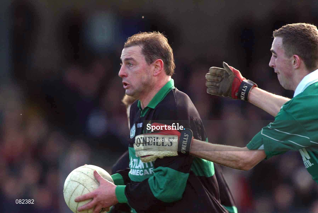 2 March 2002; Stephen O'Brien of Nemo Rangers in action against Mark Caffrey of Charlestown Sarsfields during the AIB GAA Football All-Ireland Senior Club Championship Semi-Final match between Nemo Rangers and Charlestown Sarsfield at McDonagh Park in Nenagh, Tipperary. Photo by David Maher/Sportsfile