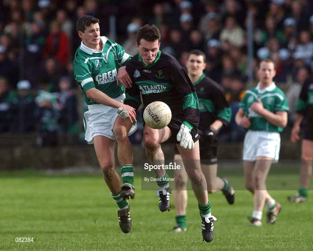 2 March 2002; Kevin Cahill of Nemo Rangers in action against Aidan Higgins of Charlestown Sarsfields during the AIB GAA Football All-Ireland Senior Club Championship Semi-Final match between Nemo Rangers and Charlestown Sarsfield at McDonagh Park in Nenagh, Tipperary. Photo by David Maher/Sportsfile