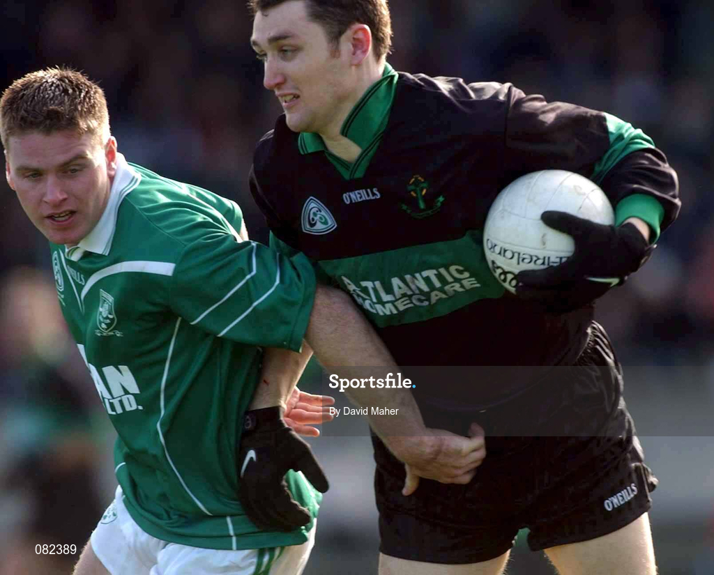2 March 2002; Maurice McCarthy of Nemo Rangers in action against Dermot Higgins of Charlestown Sarsfields during the AIB GAA Football All-Ireland Senior Club Championship Semi-Final match between Nemo Rangers and Charlestown Sarsfield at McDonagh Park in Nenagh, Tipperary. Photo by David Maher/Sportsfile