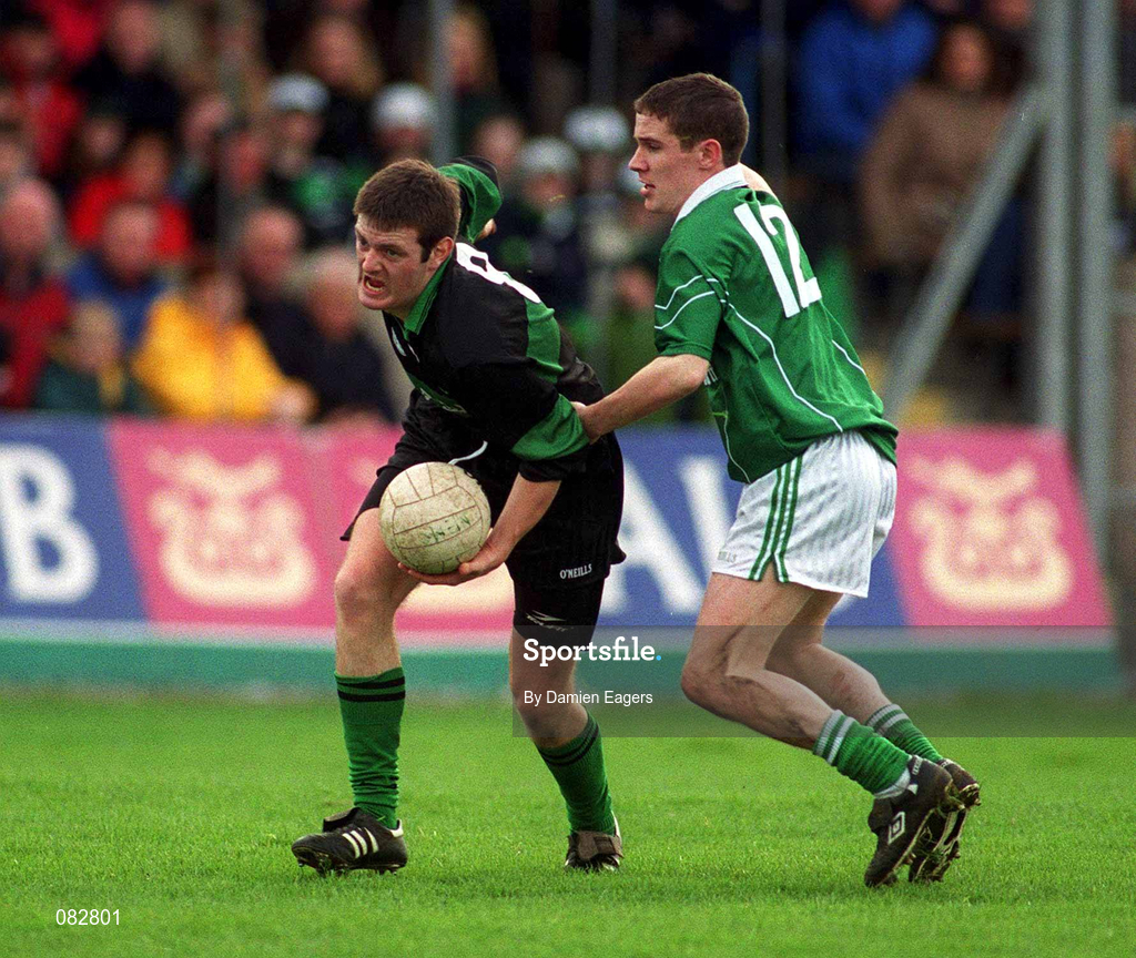 2 March 2002; Derek Kavanagh of Nemo Rangers in action against Mark Caffrey of Charlestown Sarsfields during the AIB GAA Football All-Ireland Senior Club Championship Semi-Final match between Nemo Rangers and Charlestown Sarsfield at McDonagh Park in Nenagh, Tipperary. Photo by Damien Eagers/Sportsfile