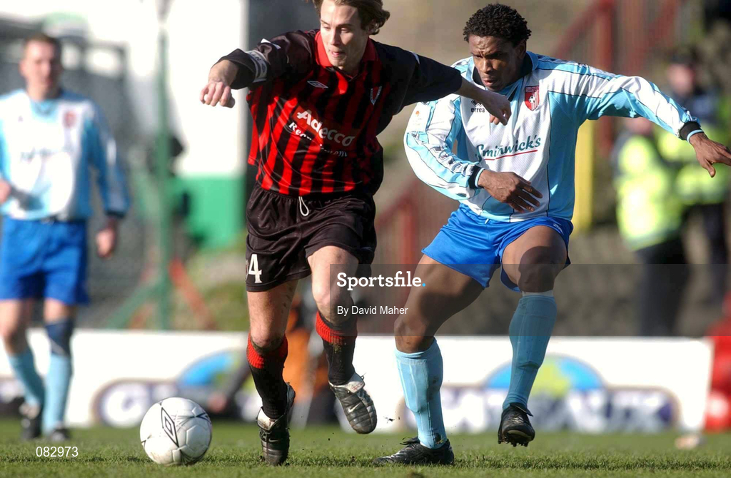 10 March 2002; Kevin Hunt of Bohemians in action against Derek Phillips of Derry City during the FAI Carlsberg Cup Semi-Final match between Bohemians and Derry City at Dalymount Park in Dublin. Photo by David Maher/Sportsfile