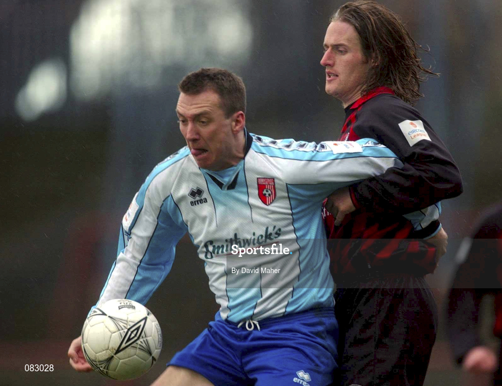 10 March 2002; Liam Coyle of Derry City in action against Simon Webb of Bohemians during the FAI Carlsberg Cup Semi-Final match between Bohemians and Derry City at Dalymount Park in Dublin. Photo by David Maher/Sportsfile