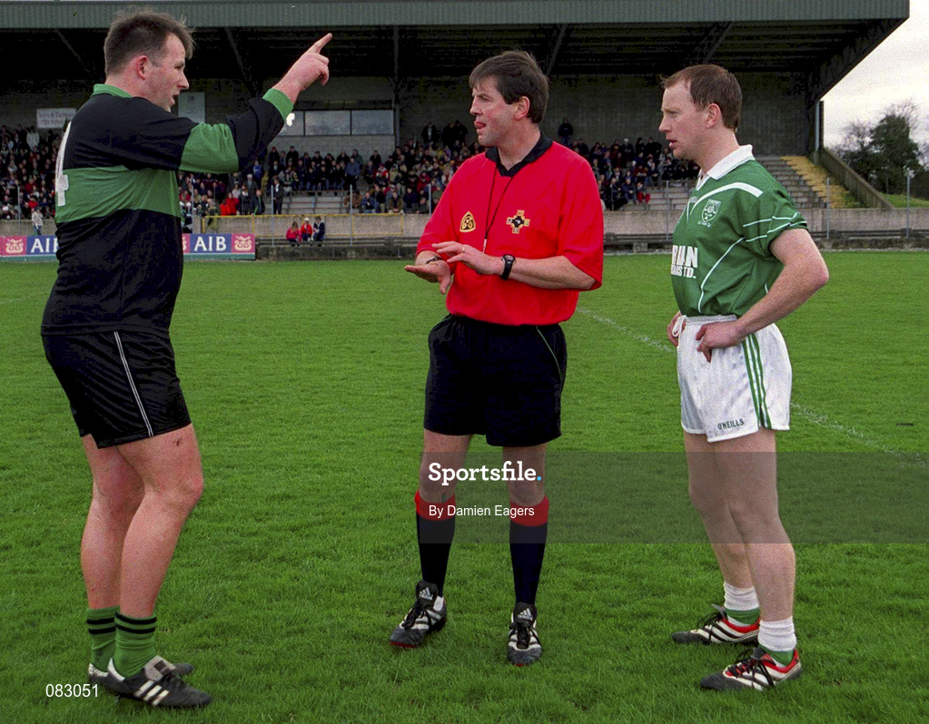 2 March 2002; Nemo Rangers captain Colin Corkery, left, Charlestown Sarsfield captain David Tiernan, right, and referee Michael Monahan prior to the AIB GAA Football All-Ireland Senior Club Championship Semi-Final match between Nemo Rangers and Charlestown Sarsfield at McDonagh Park in Nenagh, Tipperary. Photo by Damien Eagers/Sportsfile