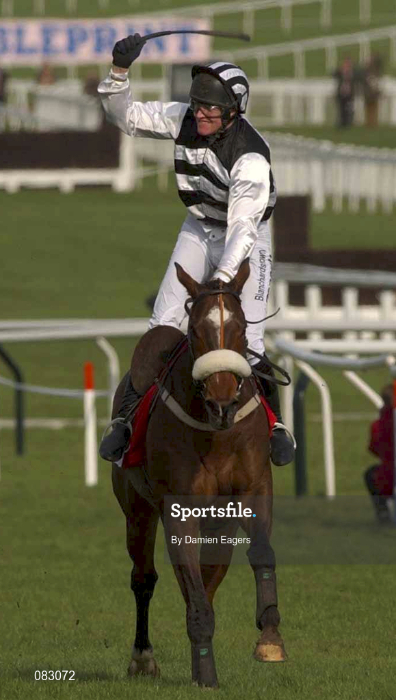 12 March 2002; Jockey Barry Geraghty celebrates after riding Moscow Flyer to victory in the Irish Independent Arkle Challenge Trophy Steeplechase during day one of the Cheltenham Racing Festival at Prestbury Park in Cheltenham, England. Photo by Damien Eagers/Sportsfile