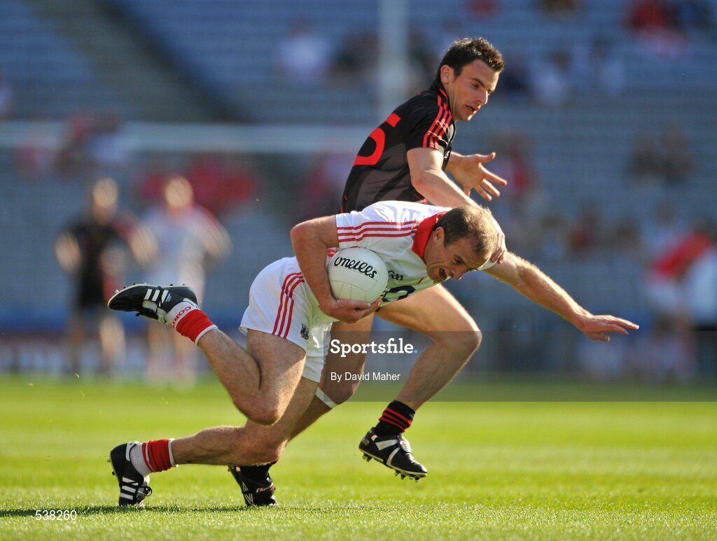 23 July 2011; Paudie Kissane, Cork, in action against Danny Hughes, Down. GAA Football All-Ireland Senior Championship Qualifier Round 4, Cork v Down, Croke Park, Dublin. Picture credit: David Maher / SPORTSFIL