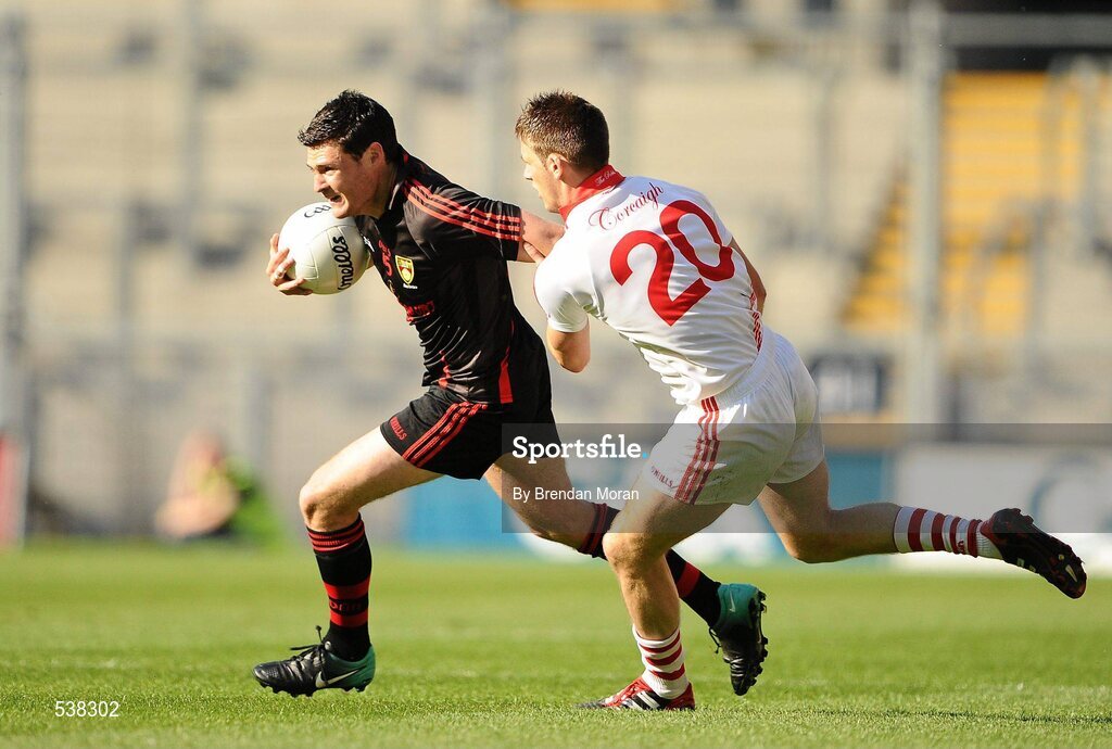 23 July 2011; Martin Clarke, Down, in action against Eoin Cadogan, Cork. GAA Football All-Ireland Senior Championship Qualifier Round 4, Cork v Down, Croke Park, Dublin. Picture credit: Brendan Moran / SPORTSFILE