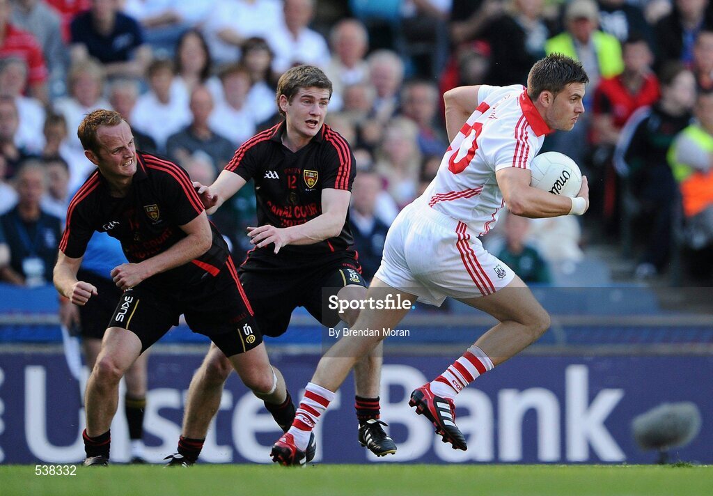23 July 2011; Eoin Cadogan, Cork, in action against Brendan Coulter, left, and Conor Maginn, Down. GAA Football All-Ireland Senior Championship Qualifier Round 4, Cork v Down, Croke Park, Dublin. Picture credit: Brendan Moran / SPORTSFILE