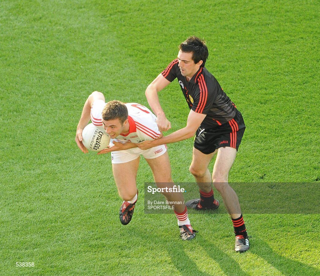 23 July 2011; Fiachra Lynch, Cork, in action against Gerard McCartan, Down. GAA Football All-Ireland Senior Championship Qualifier Round 4, Cork v Down, Croke Park, Dublin. Picture credit: Dáire Brennan / SPORTSFILE3