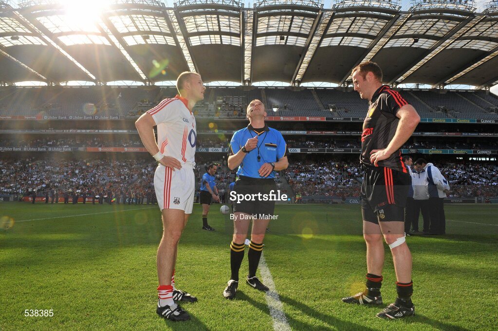 23 July 2011; Referee Michael Duffy with captains, Michael Shields, Cork, and Brendan Coulter , Down, before the start of the game. GAA Football All-Ireland Senior Championship Qualifier Round 4, Cork v Down, Croke Park, Dublin. Picture credit: David Maher / SPORTSFILE