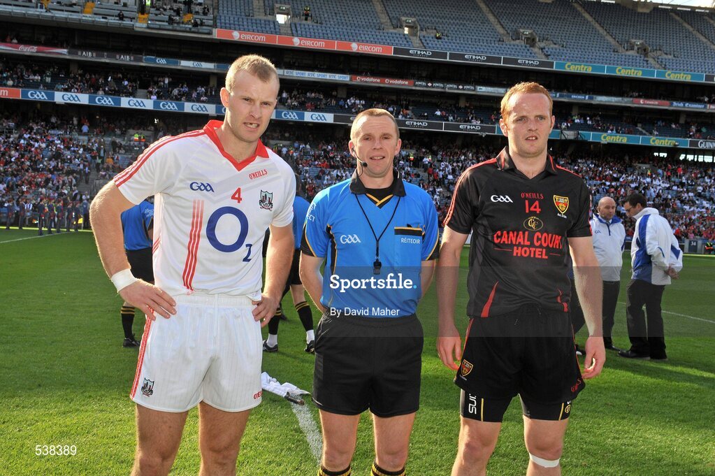 23 July 2011; Referee Michael Duffy with captains, Michael Shields, left, Cork, and Brendan Coulter, Down, before the start of the game. GAA Football All-Ireland Senior Championship Qualifier Round 4, Cork v Down, Croke Park, Dublin. Picture credit: David Maher / SPORTSFILE