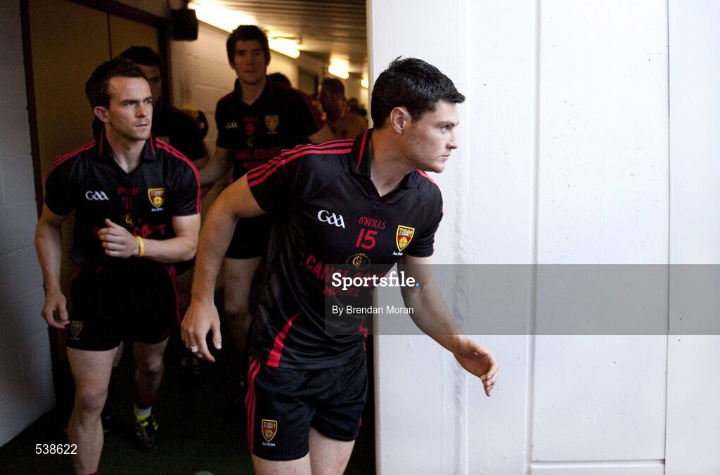 23 July 2011; Down players Martin Clarke, right, and Mark Poland make their way out onto the pitch before the start of the game. GAA Football All-Ireland Senior Championship Qualifier Round 4, Cork v Down, Croke Park, Dublin. Picture credit: Brendan Moran / SPORTSFILE