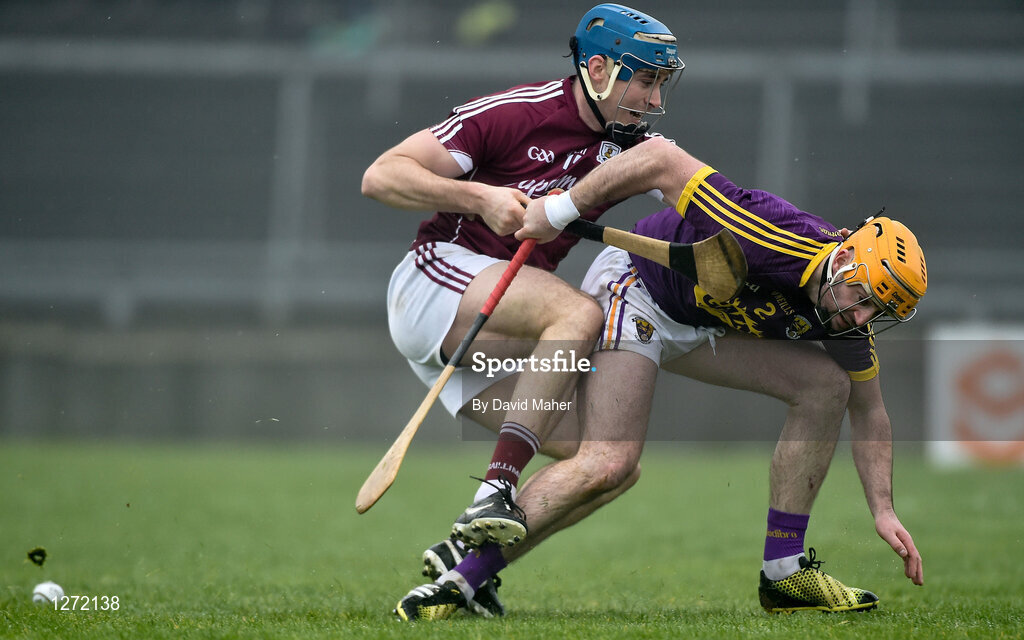 19 February 2017; Conor Cooney of Galway in action against Eóin Moore of Wexford during the Allianz Hurling League Division 1B Round 2 match between Galway and Wexford at Pearse Stadium in Galway. Photo by David Maher/Sportsfile