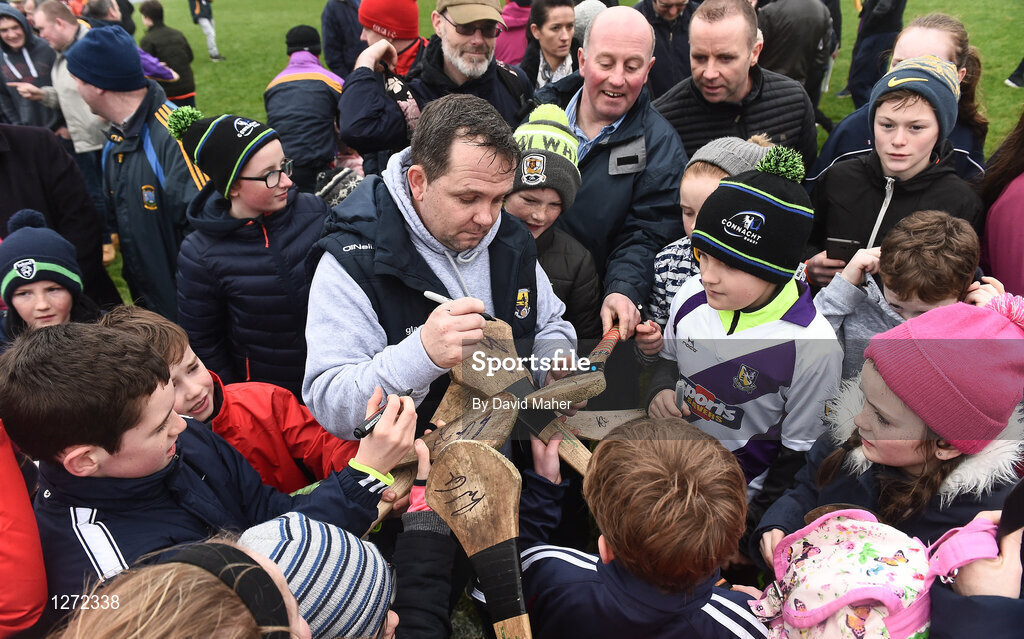 19 February 2017; Wexford manager Davy Fitzgerald signs autographs for supporters at the end of the Allianz Hurling League Division 1B Round 2 match between Galway and Wexford at Pearse Stadium in Galway. Photo by David Maher/Sportsfile